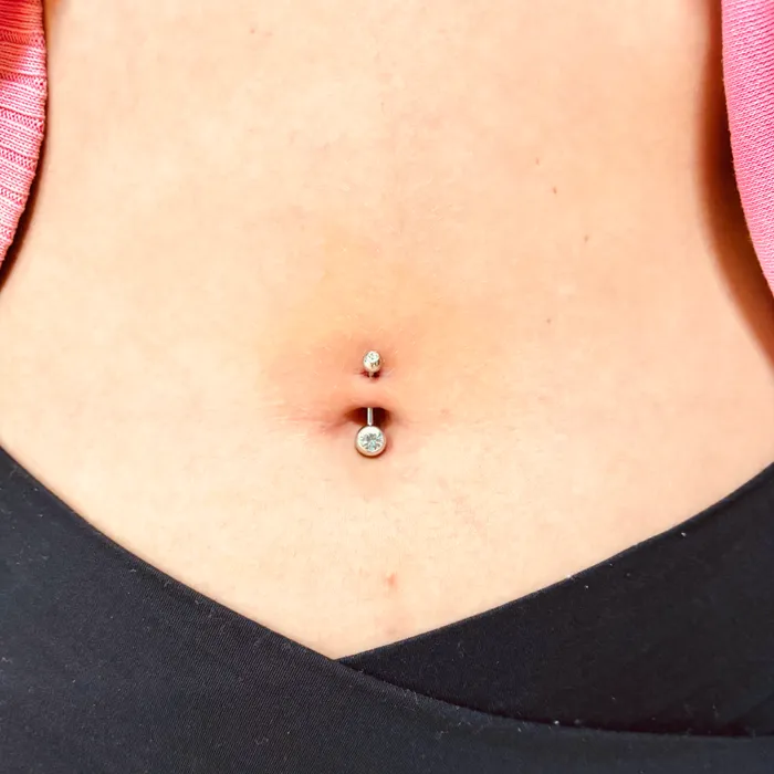 Healed bellybutton piercing
